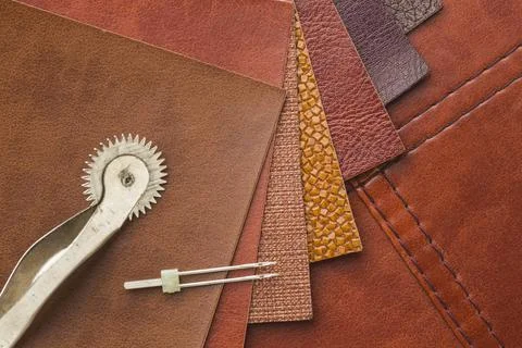 Top view leather with needle. High quality and resolution beautiful photo Stock Photos