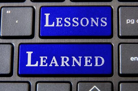 Top view of lessons learned text on laptop keyboard. Learning concept Foto stock
