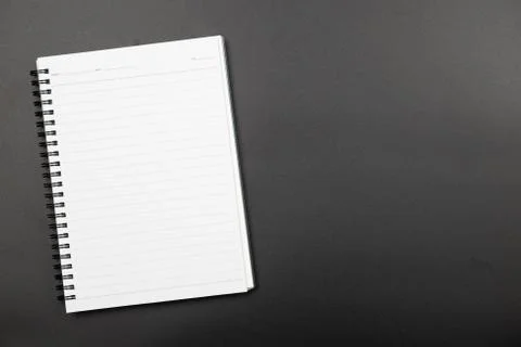 Top view of line notebook on black background Stock Photos