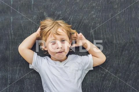 Top view of a little blond kid boy with space for text and symbols on the o.. Stock Photos