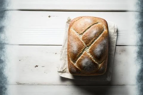 Top view of loaf of bread on white vintage table Stock Illustration