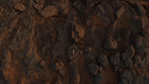 Top view of a lone astronaut on Mars. The astronaut lies on the surface of the Stock Footage 126776912