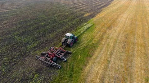Top view lonely tractor plowing field Stock Footage 88441455