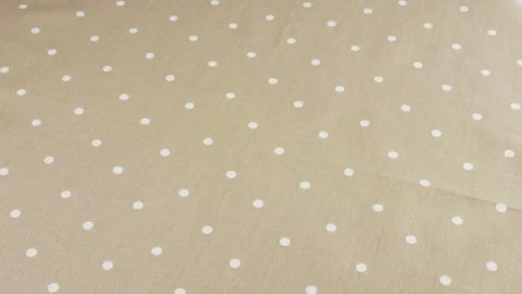 Top view of the lovender grey with white polka dots cotton fabric rotated  Stock Footage 293882518