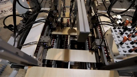 The top view of the machine of the doing holes in details of cabinet furniture Video stock 91808739