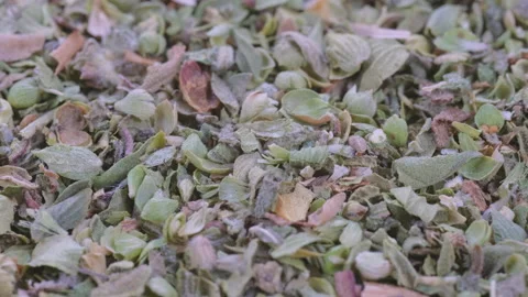 Top view, macro. Heap of ground dried thyme spice. Slider shot. Stock Footage 292511955