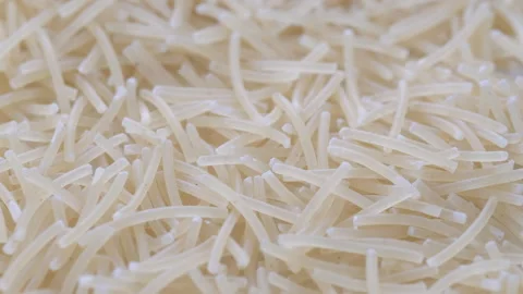 Top view, macro. Pile of uncooked vermicelli pasta. Slider shot. Stock Footage 292516957