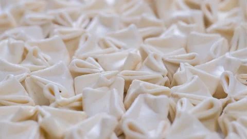Top view macro shot of Turkish ravioli pastry Manti, camera moves backward Stock Footage 285910600