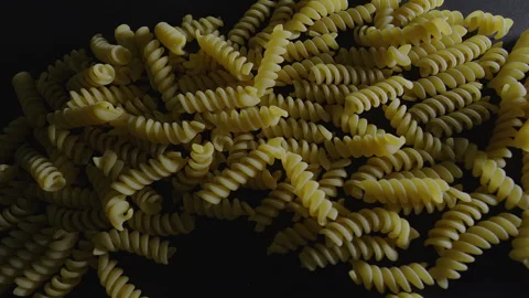 Top View Macro Slider Shot of Fusilli Pasta in 50p Stock Footage 336028887