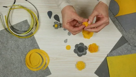 Top view of making felt flowers. Handmade headband Stock Footage 84769061