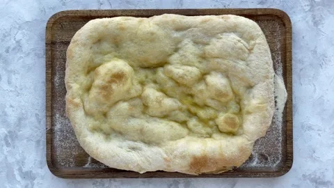 Top view of making a pizza with ingredients. Stop motion animation Stock Footage 165377265