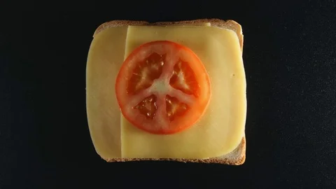 TOP VIEW: Making ready a sandwich (stop motion) Stock Footage 70804582