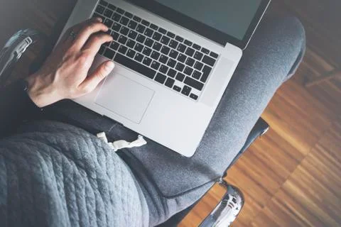 Top view of male hands using modern laptop, young man working Stock Photos