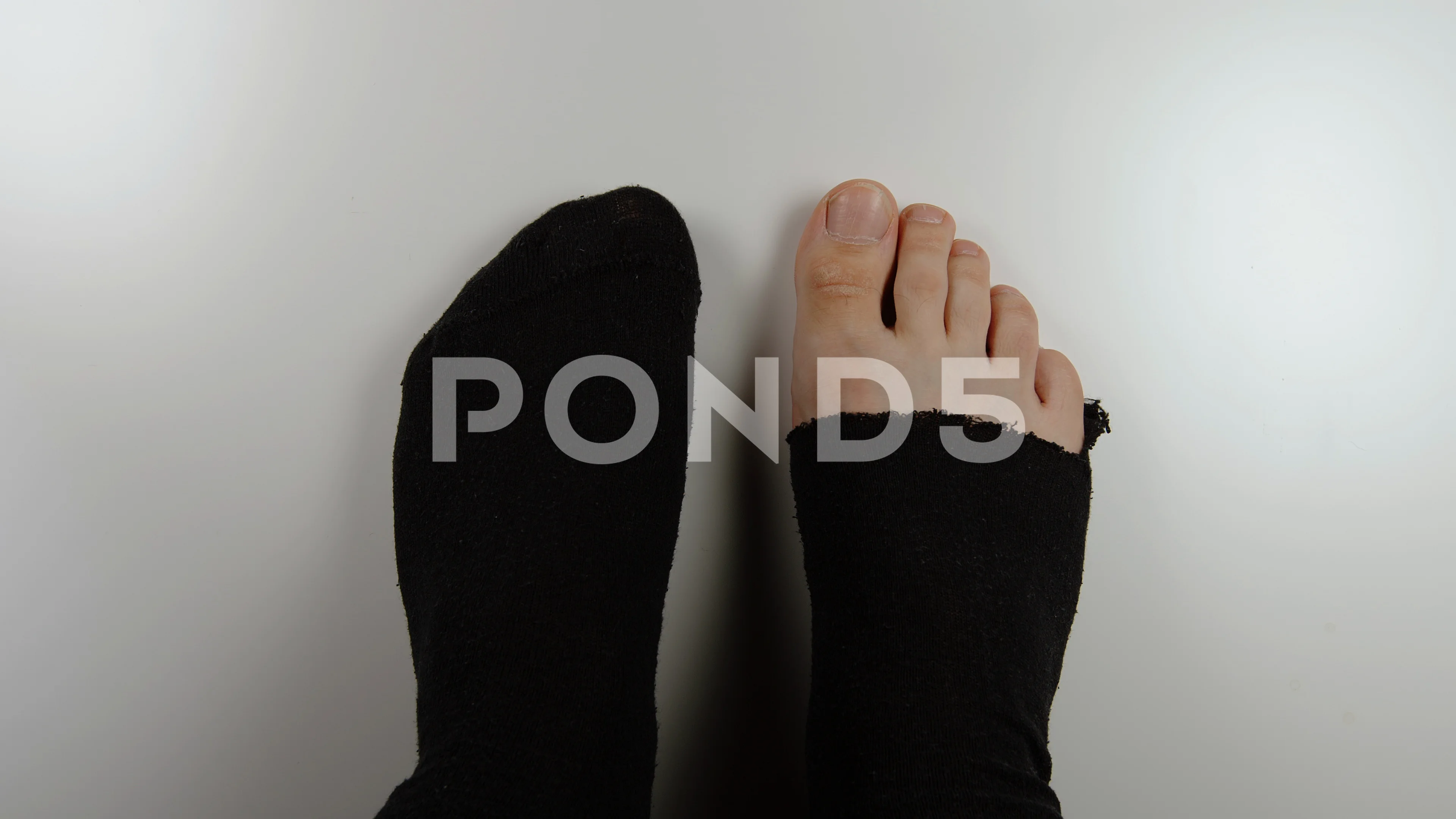 TOP VIEW: Male legs with Socks with a ho, Stock Video