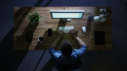 Top View of Male Programmer Working at His Desktop Computer at Night.  Stock Footage 71467002