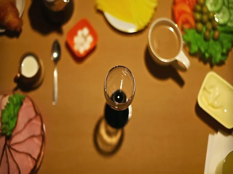 Top view males hands pouring wine into a glass female taking a glass of wine Stock Footage 73258115