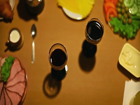 Top view males hands pouring wine into glasses female and male taking glasses Stock Footage 73258533
