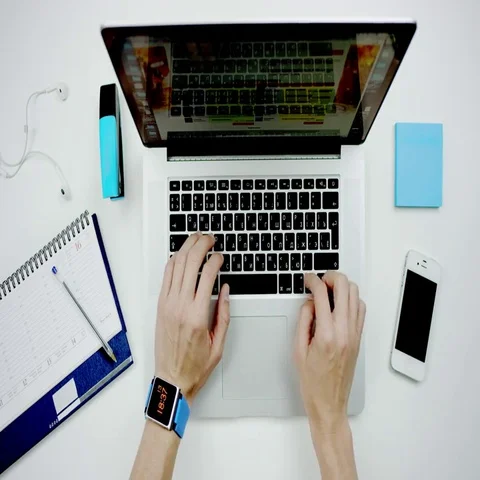 Top view of a man closing a laptop Stock Footage 69705119