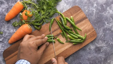 Top view of man hand processing vegetable Stock Footage 124625820