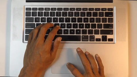 Top view man hand working on laptop computer Stock Footage 114652436
