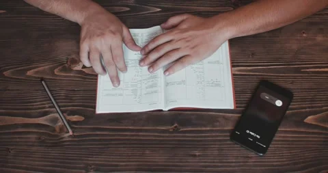 Top view man hands answering the phone and leaves office close up Video stock 260939381