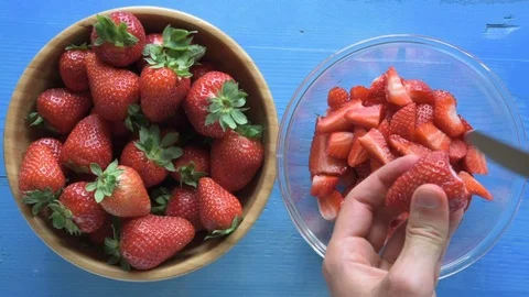 Top View Man Hands Slicing Fresh Organic Strawberries Stock Footage 76635166