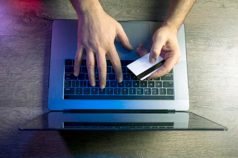 Top view man hands using credit card register and payments online shopping Stock Photos