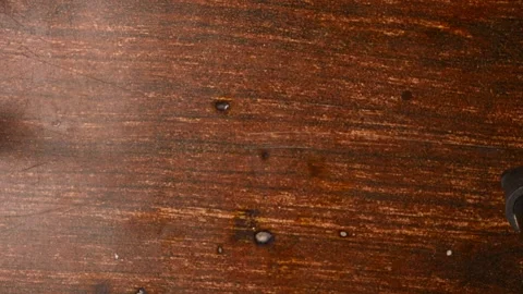 Top View of Man Placing 500 Rupee Note Bundles on Wooden Table Stock Footage 329343678