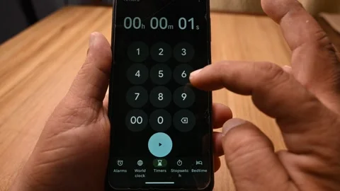 Top View Man Setting 10 Second Timer on Smartphone, Mobile Countdown Action Stock Footage 333550938