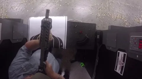 Top view of man shooting assault rifle Stock-Footage 61088618