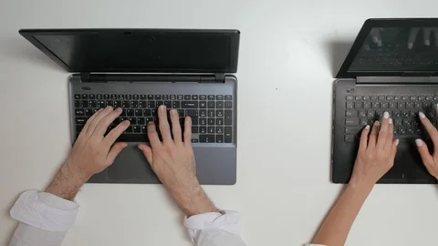 Top view of man using computer on office table. Stockbeeldmateriaal 91506598
