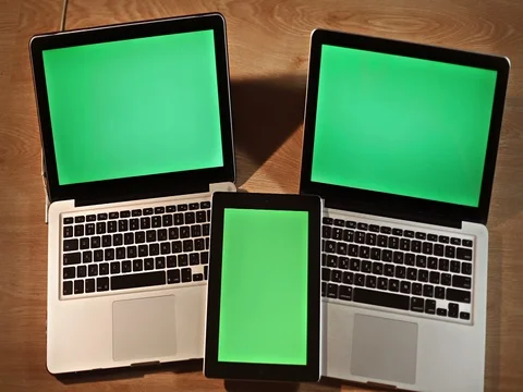 Top view man using digital tablet and two laptops Stock Footage 72412730