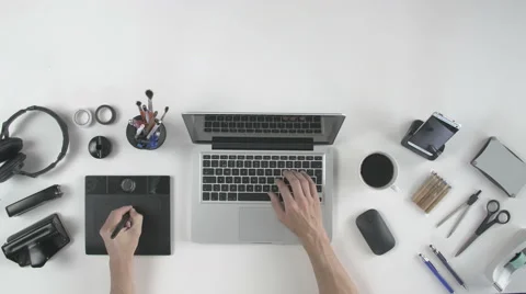 Top view man using his pen tablet Stock Footage 64776646