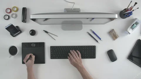 Top view man using his pen tablet Stock Footage 64776682