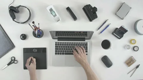 Top view man using his pen tablet Stock Footage 64776721