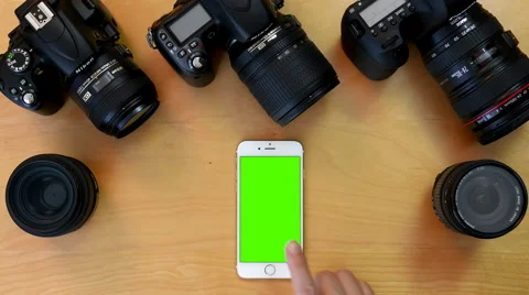 Top view of man using iphone on green screen. Stock Footage 67689455