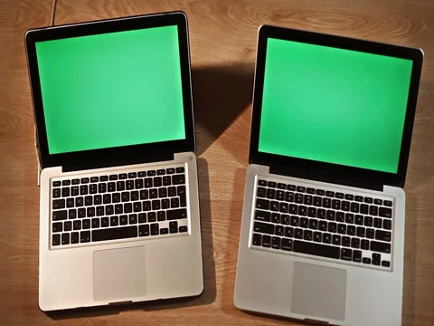 Top view man using two laptops, breaking system hacking Stock-Footage 72412376