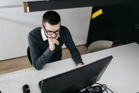 Top view of a man working on computer Stock Photos