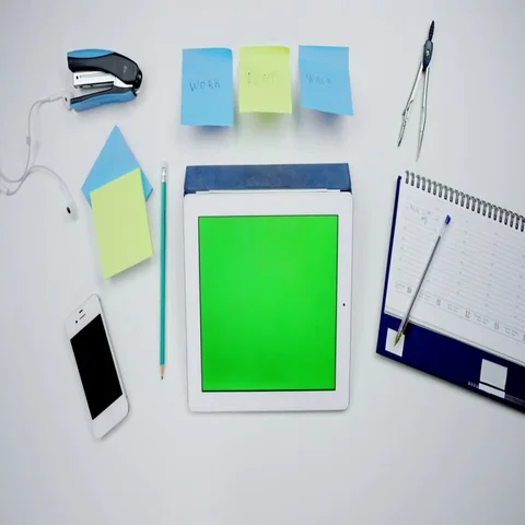 Top view of a man working with tablet with greenscreen Stock Footage 69699914