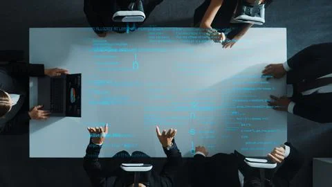 Top view of manager using laptop send data while team wear vr. Directorate. Stock Photos