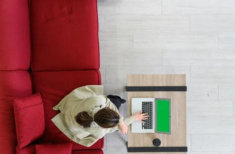 Top view of manager woman working at mock up green screen chroma key laptop.. Stock Photos
