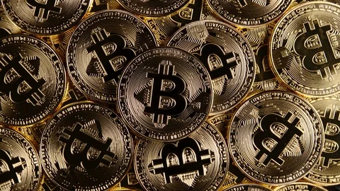 TOP VIEW: Many bitcoins rotating Stock Footage 120163188