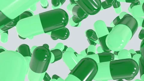 Top view of many capsule pills drop from the top in different positions Stock-Footage 133714109