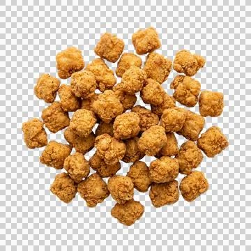 Top view of many crispy popcorn chicken pieces isolated on a transparent ba.. Stock Photos