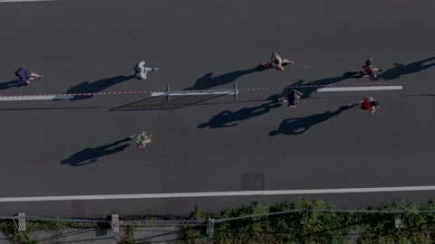 Top view of a marathon with long human shadows Stock-Footage 339866211