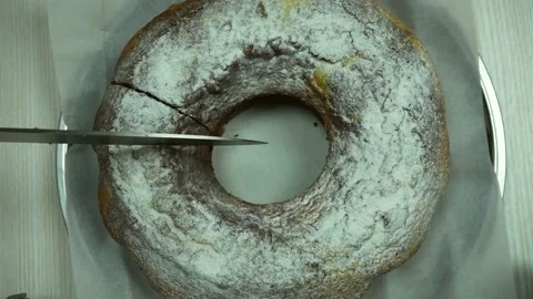 Top view of marble cake, cutting off one piece Stock Footage 233518782