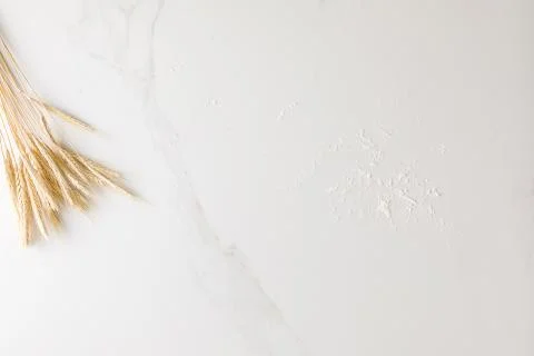 Top view of a marble table with wheat and flour with space for text Stock Photos