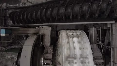 Top view Massive mills are grinding of ore at the plant Video stock 223667151