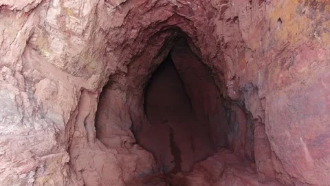 Top view on a massive pit in the forest with a tightrope over it, 4k Stock Footage 133557712