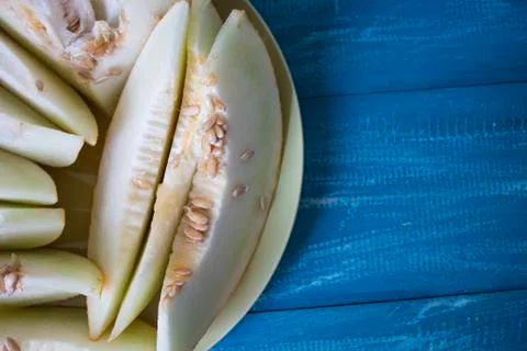 Top view of a melon. melon decorated with slices against Stock Photos